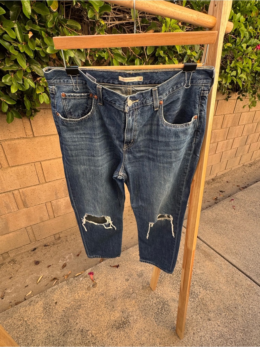 Levi's Medium Blue Denim Jeans distressed style with Tan Leather Patch